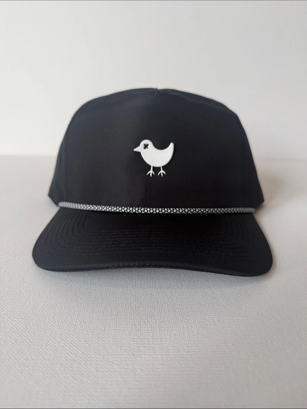 Bad Birdie Black Cap with White Bird Emblem